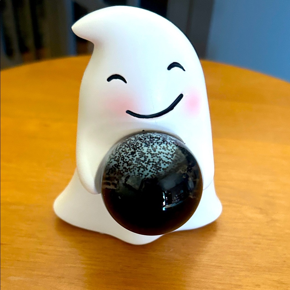 Blushing Ghost Figurine Holding A Black Glitter Ball Waterglobe
